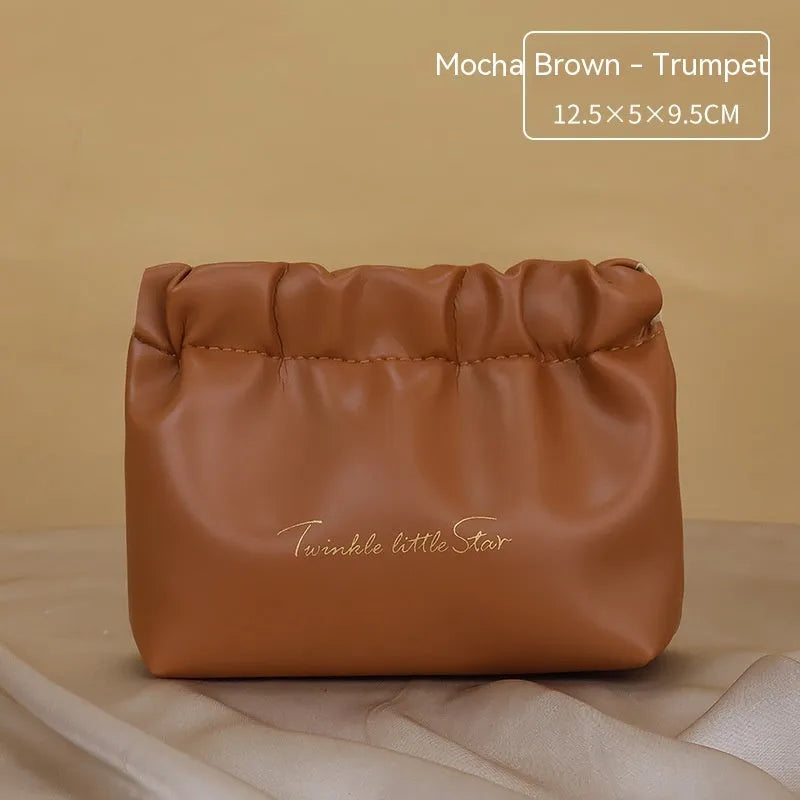 Leather travel toiletry bag with dry-wet separation compartments in caramel mocha colour