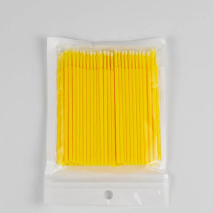 Disposable micro applicator brushes with coloured plastic handles and bendable cotton swab tips