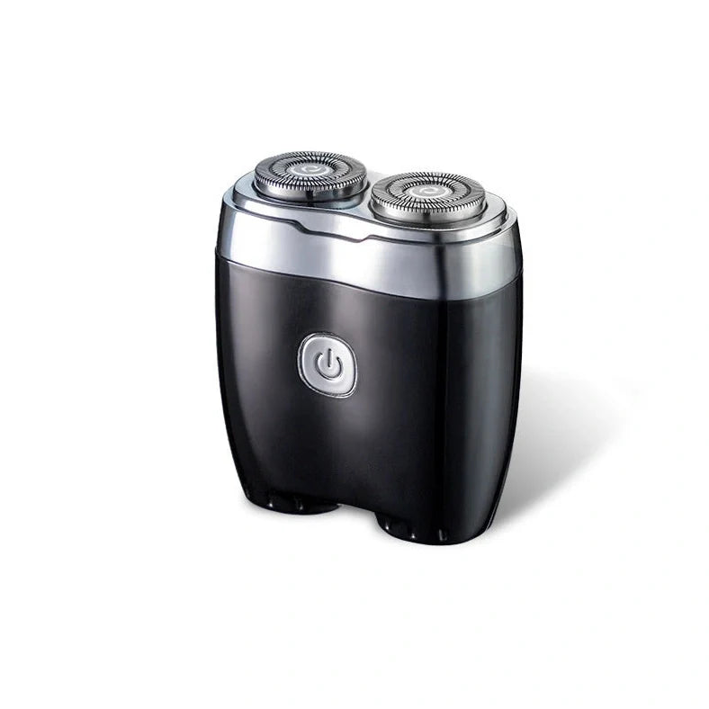 Silver portable electric shaver with floating double cutter heads, USB charging port, and rubberised grip