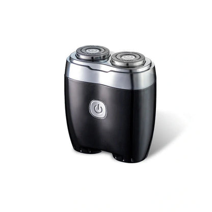 Silver portable electric shaver with floating double cutter heads, USB charging port, and rubberised grip