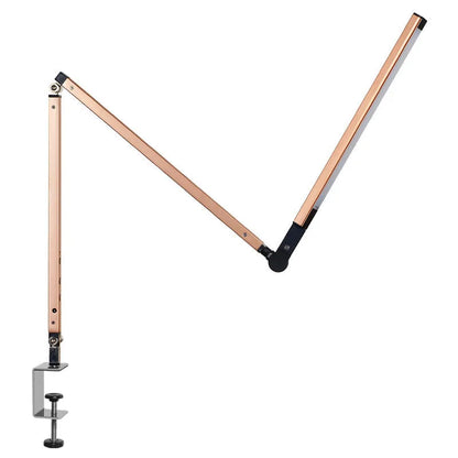 Adjustable aluminium desk lamp with remote control, shown in black with a clip attached to a desk edge.