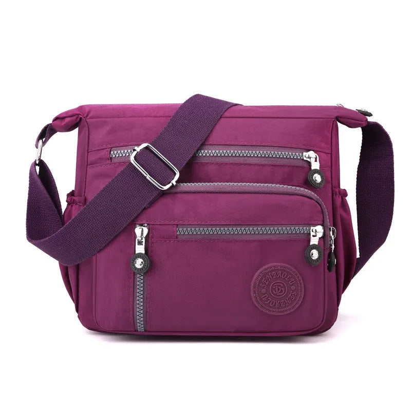 Soft nylon messenger bag in square vertical shape with adjustable shoulder strap