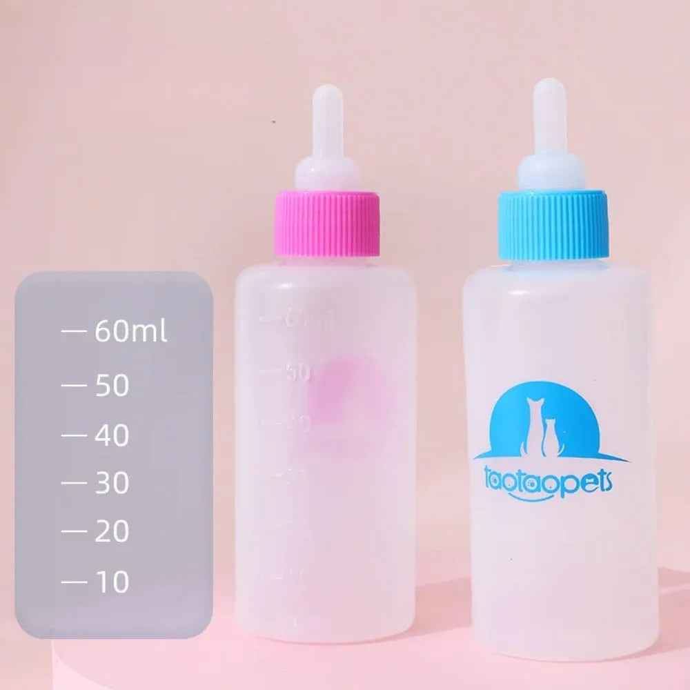 Set of four coloured pet milk bottles with silicone teats and a cleaning brush for small animals.