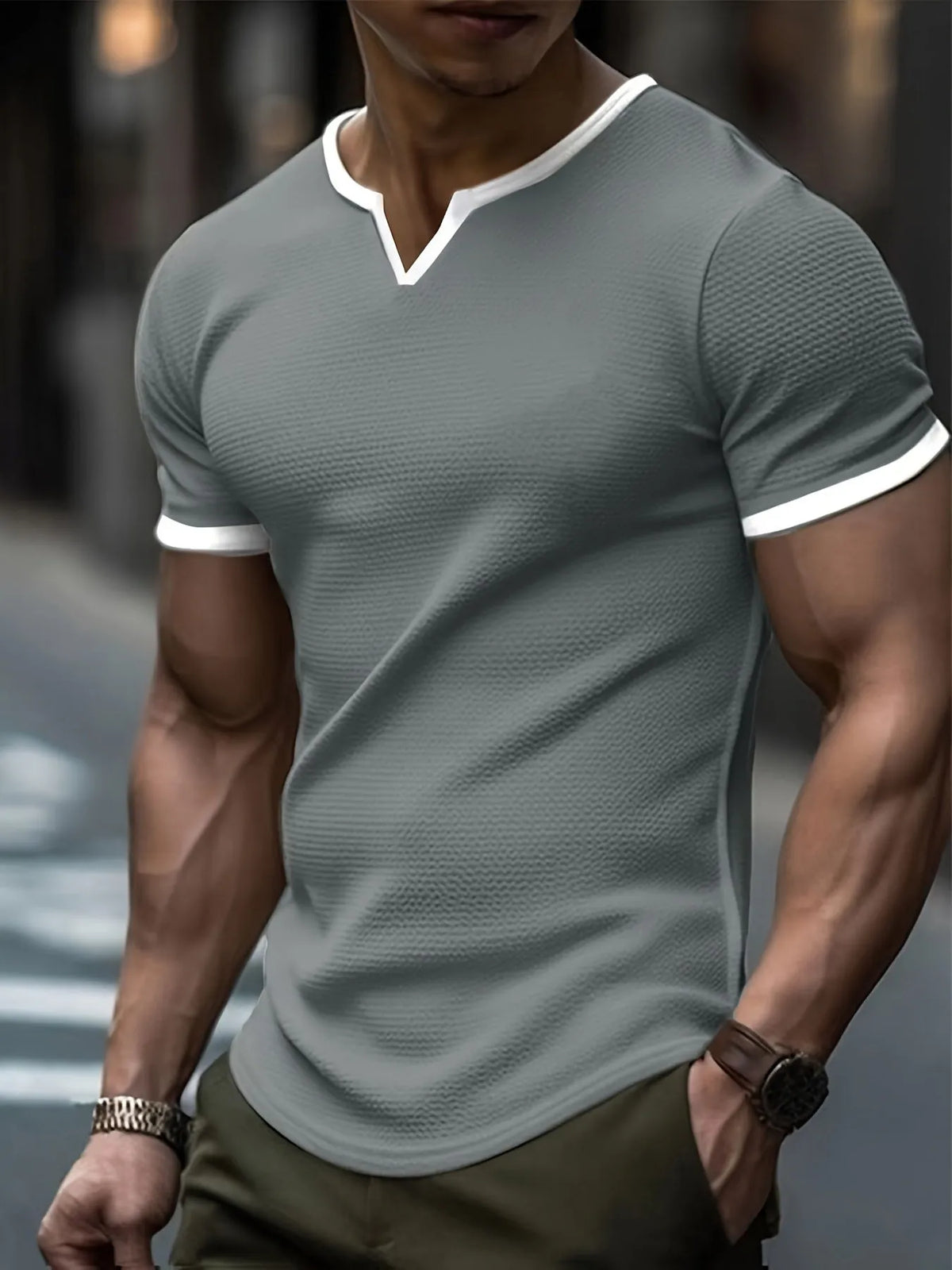 V-neck colour-block waffle texture outdoor sports T-shirt in polyester fabric on a neutral background.