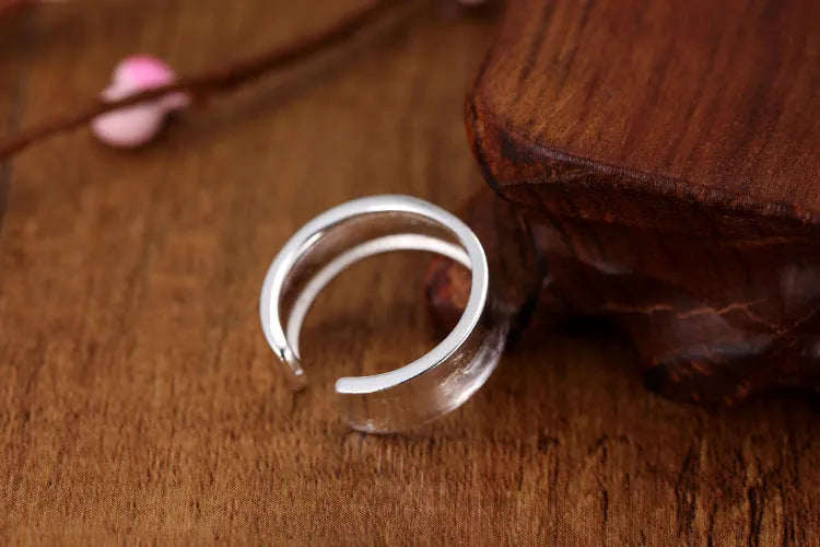Adjustable geometric open ring with frosted sterling silver finish and Korean design