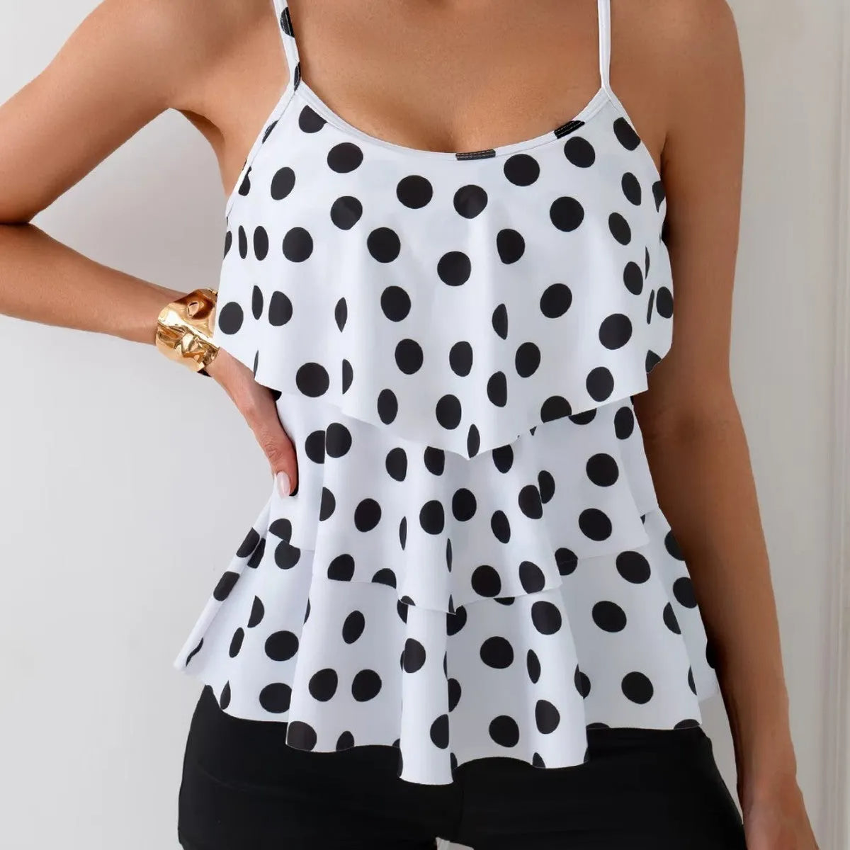 Women's black and white split swimsuit with double-shoulder straps and high-waist briefs