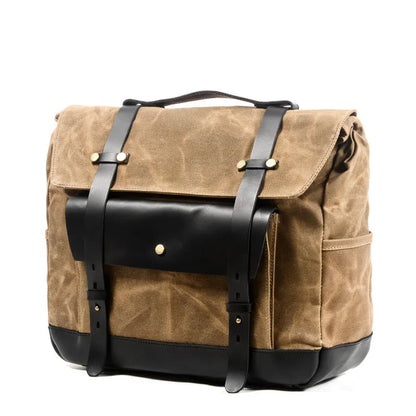 Camel Bag Knight cotton messenger bag in army green with helmet inside, showing internal organiser pockets.