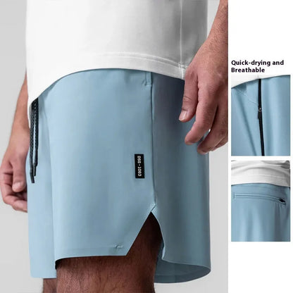 Men's seamless grey sports shorts in straight leg, knee-length quick-dry polyester design.