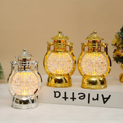 Small retro oil lamp design LED night light in gold or silver finish, 14.5cm tall.