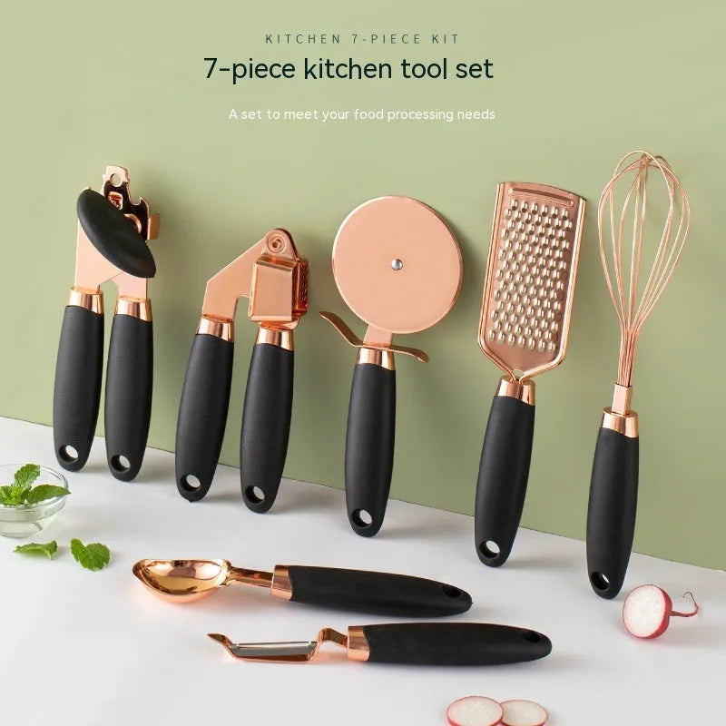 7-piece stainless steel kitchen tool set with copper finish on a countertop storage rack.