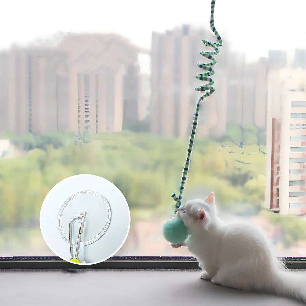 Blue interactive cat hanging toy with 8cm plush ball on 70cm stretch wand to 180cm, sucker base for window play