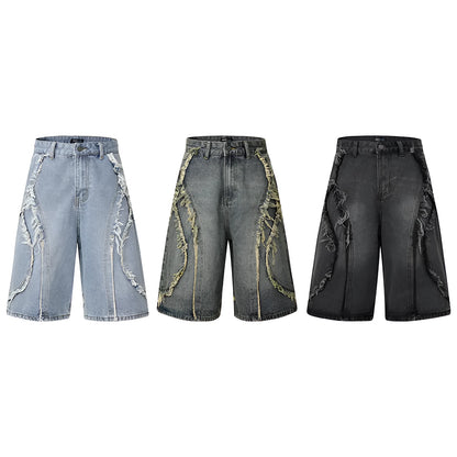 American Pu Shuai distressed denim shorts with raw-edge hem in light blue, shown on a model.