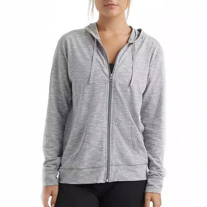 A loose fit solid colour hooded sweatshirt on a hanger, shown in one of six colour options.