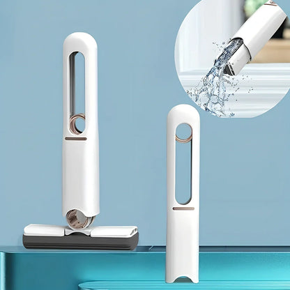 Portable self-squeezing mini mop with biodegradable cotton head and 180-degree folding mechanism