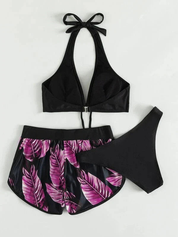 A stylish 3-piece leaf print bikini set with matching shorts, available in a variety of vibrant colors and patterns