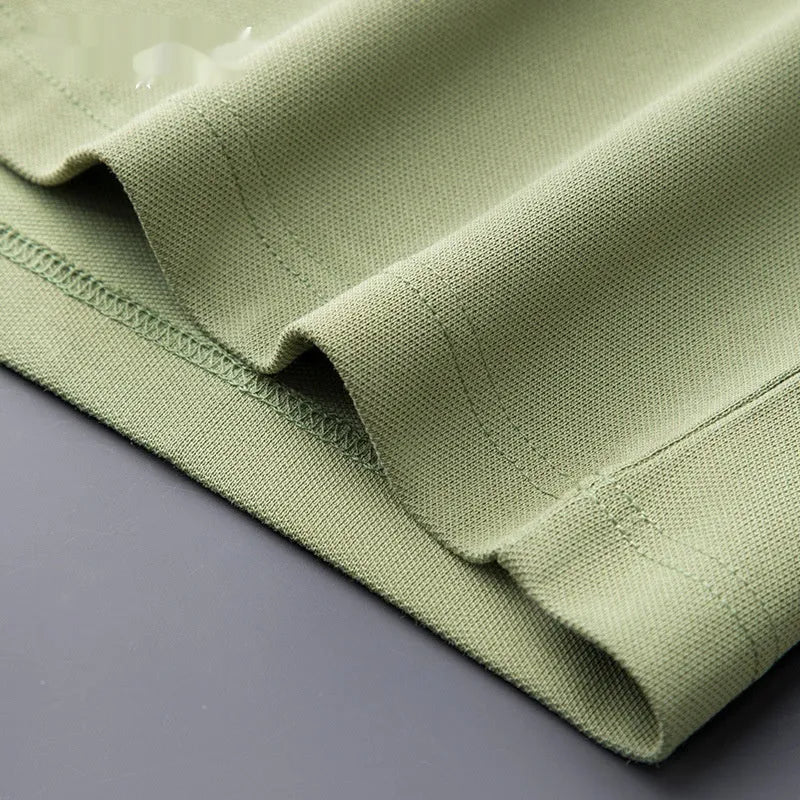 Men's slim fit lapel silk business casual short sleeve top in a cotton blend fabric.