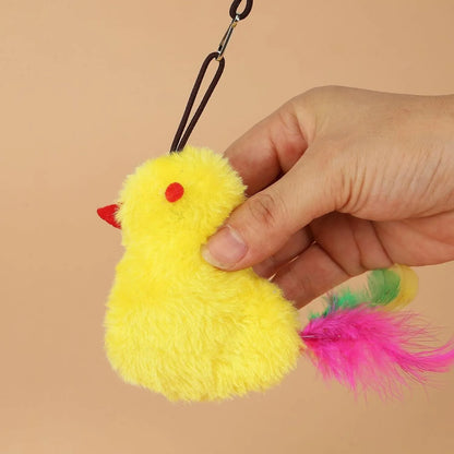 Interactive cat toy hanging from door frame with elastic rope, sound response system, and treat reward dispenser