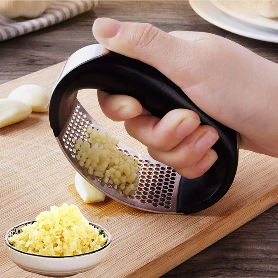 Stainless steel garlic press with non-slip handle for easy crushing