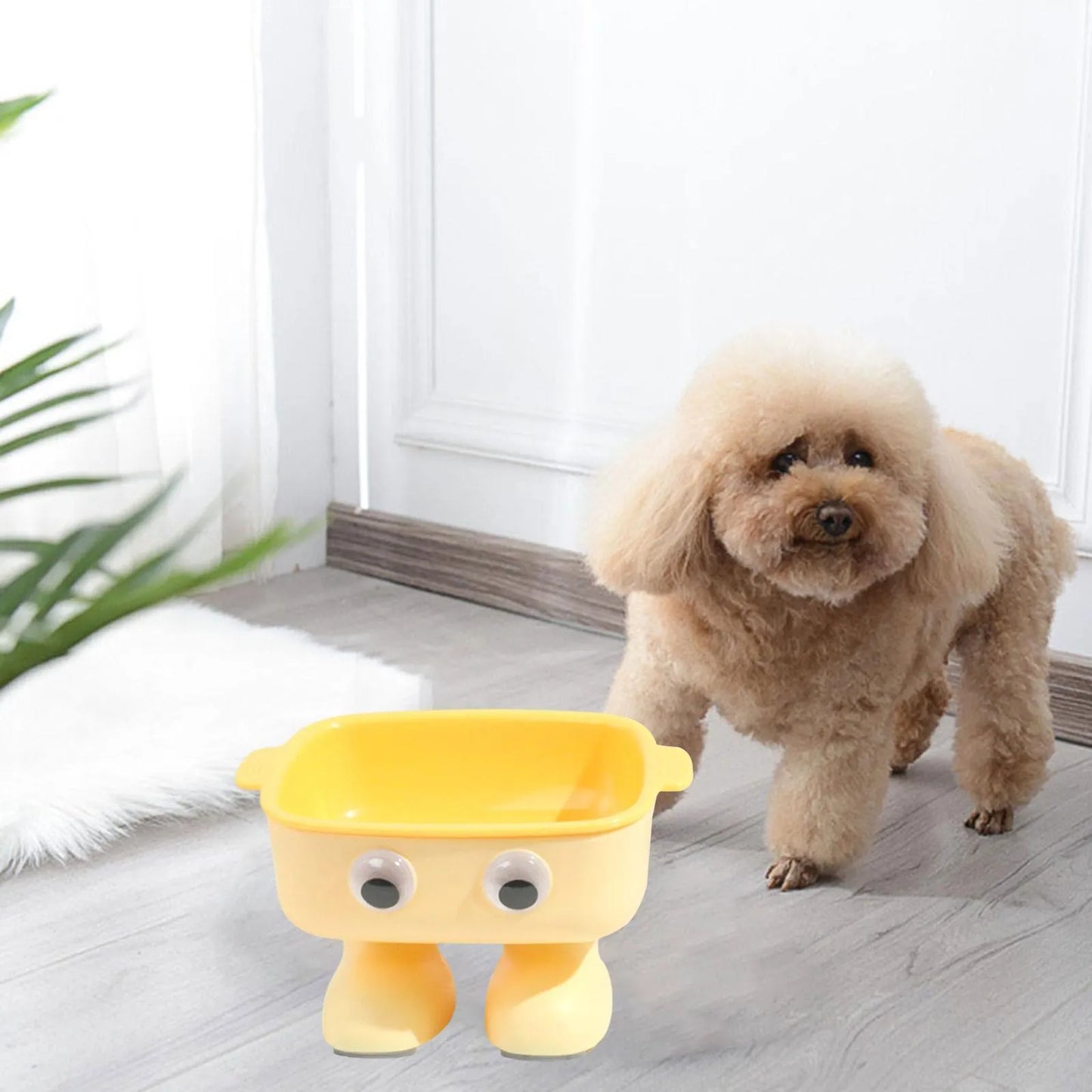 Robot-shaped elevated cat bowl with 15 degree tilt in green colour with detachable inner bowl