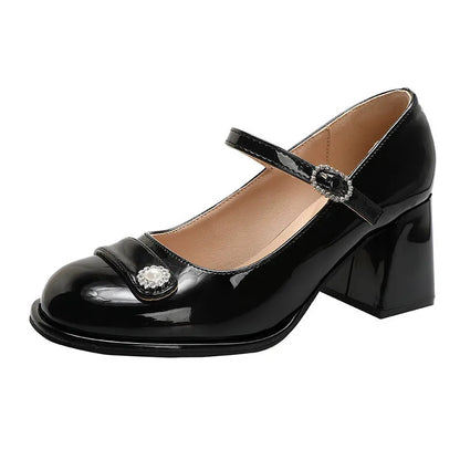 Black patent leather women's high heels with a chunky heel, round toe, and buckle fastening.