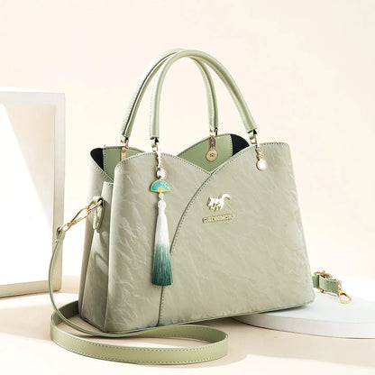 Women's soft PU messenger bag with sewing thread detail, horizontal square shoulder bag in beige, black, green, or red