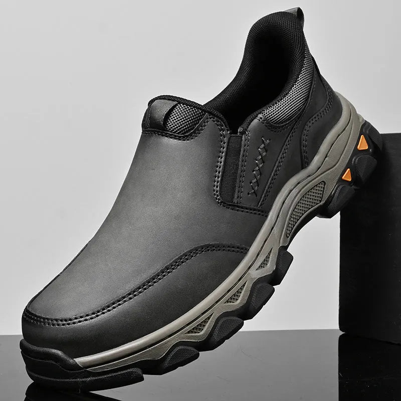 Men's round-toe casual leather shoes with a flat heel and rubber sole in black, brown, or grey.