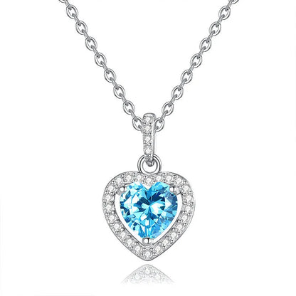 S925 sterling silver necklace with a heart-shaped pendant featuring a round natural gemstone on a cross chain.