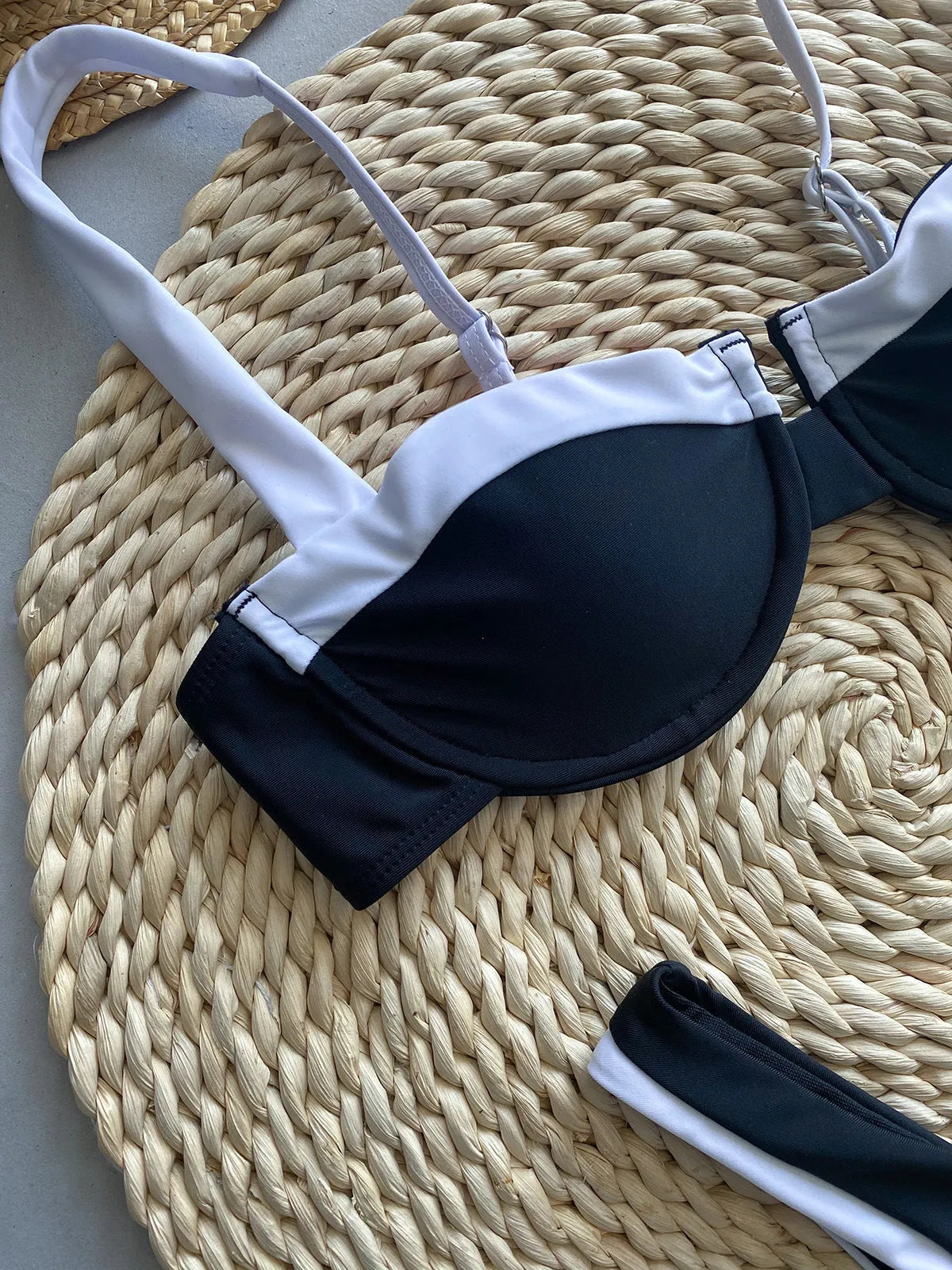 Black women's bikini briefs with a sexy pattern, made from nylon fabric.