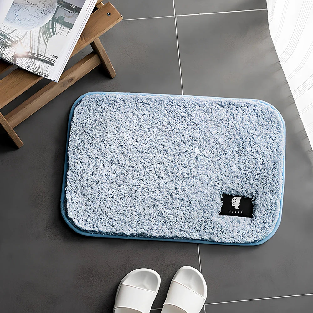 Rectangular anti-slip bathroom mat with polyester fibre construction in multiple colour options