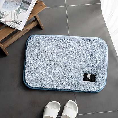 Rectangular anti-slip bathroom mat with polyester fibre construction in multiple colour options