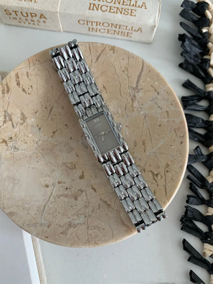 Bracelet-style women's watch with 15mm dial, 7mm thickness, and mineral glass mirror in silver or gold colours