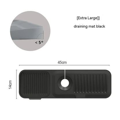 Silicone faucet splash guard with sloped design and dual drains for efficient water drainage in kitchen and bathroom sinks