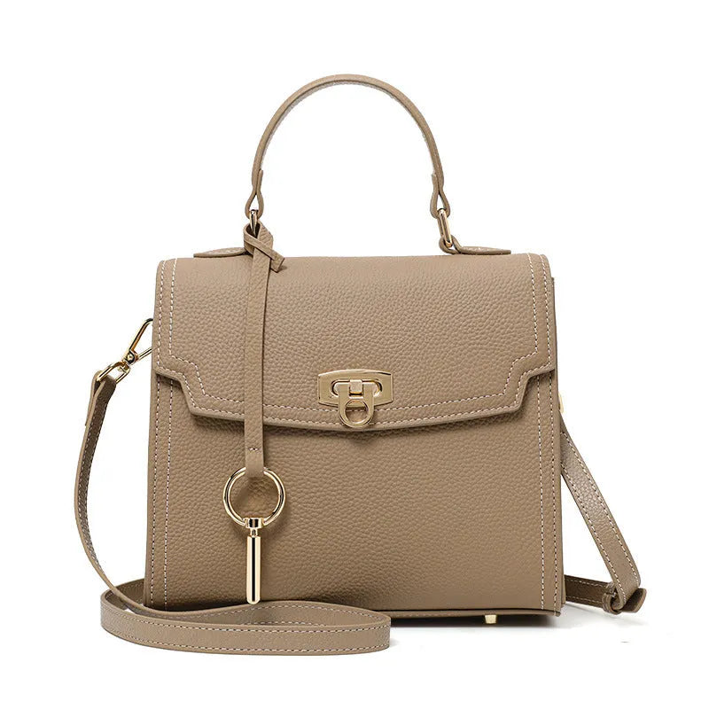 Elephant grey vintage handbag with lock detail and file organisation inside