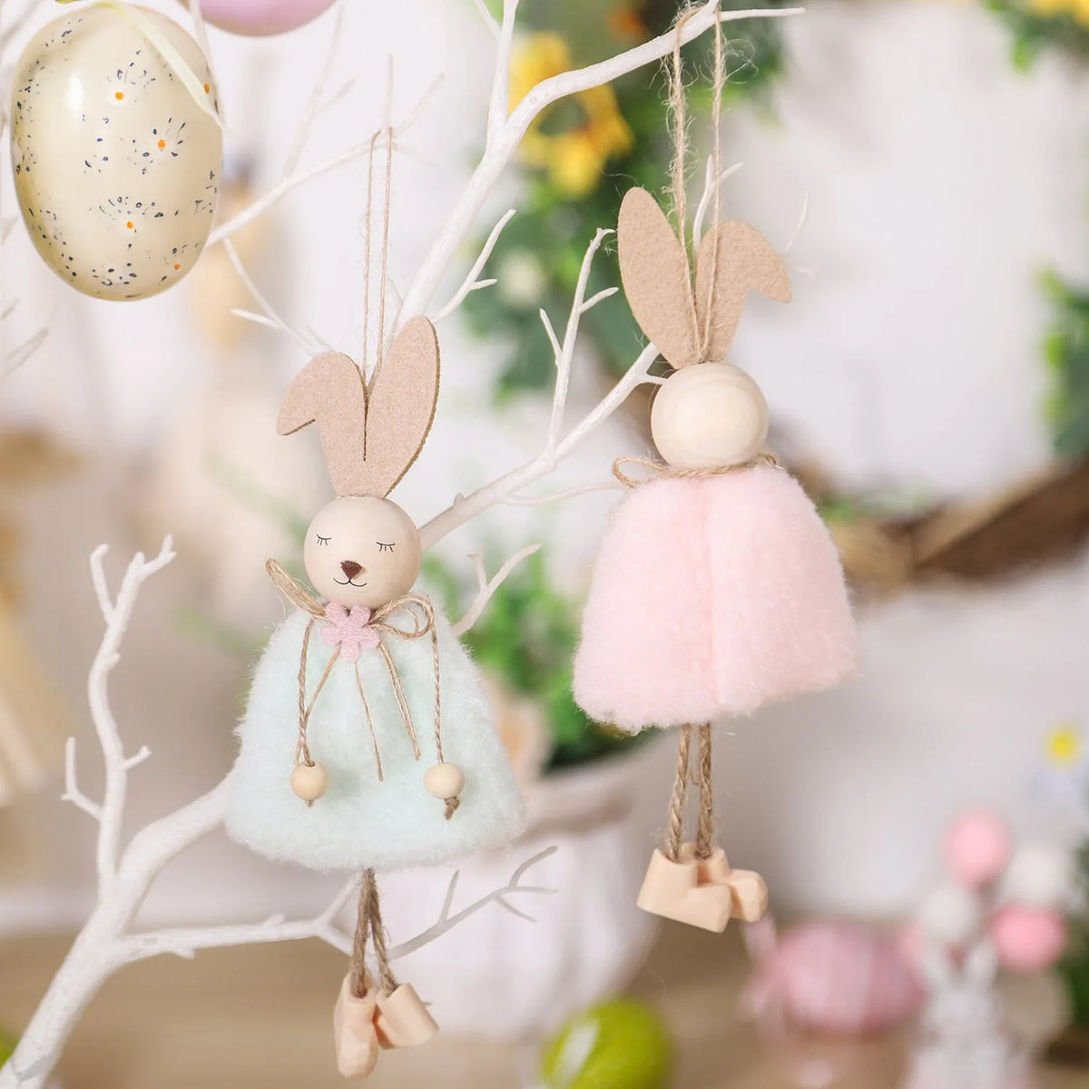 Cartoon rabbit cloth pendant Easter decoration hanging from a ribbon.