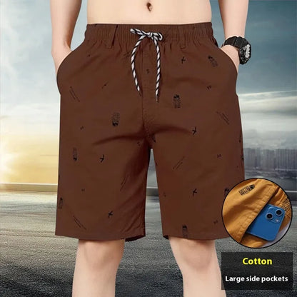 Women's army green loose cropped cotton summer trousers on a white background.