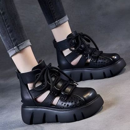 Women's platform sandals with hollow hole design in soft cowhide leather, shown in black colour with sporty styling