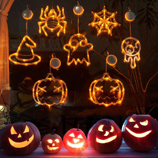 Spooky Halloween window lights featuring ghostly silhouettes, carved pumpkins, and creepy spiders for festive seasonal decor