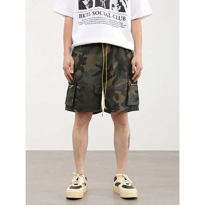 Men's camouflage coloured cargo shorts with multiple pockets and cropped leg length