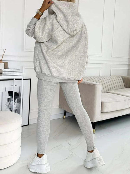 Women's 3-piece sports suit with hooded sweatshirt, vest, and slim trousers in various colours