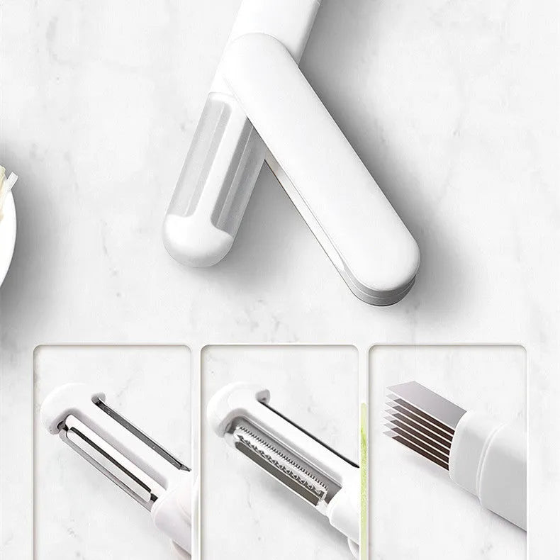 White multifunctional rotary kitchen peeler with stainless steel blade and ergonomic PP handle.