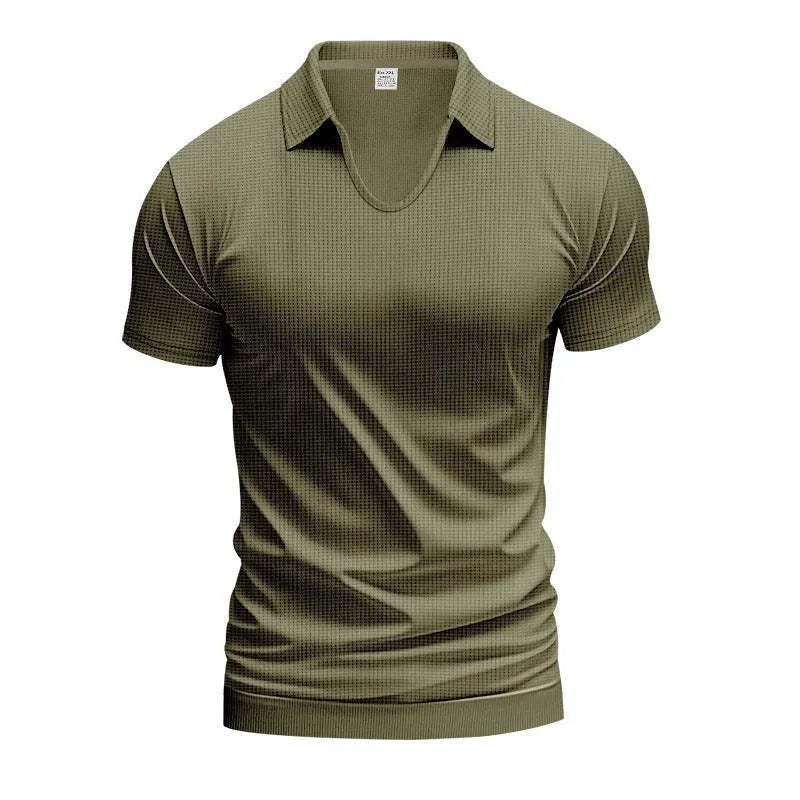 Man modelling a loose-fit apricot coloured V-neck short-sleeve T-shirt for casual summer wear.