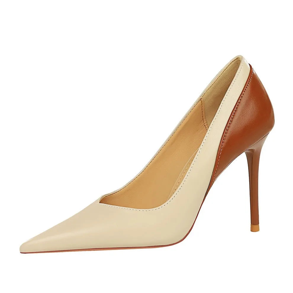 Retro style black stiletto high heels with pointed toe and colour matching pattern