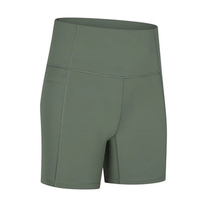 Women's tight-fitting cotton blend sports shorts in black, showing super stretch function and fifth pants length.