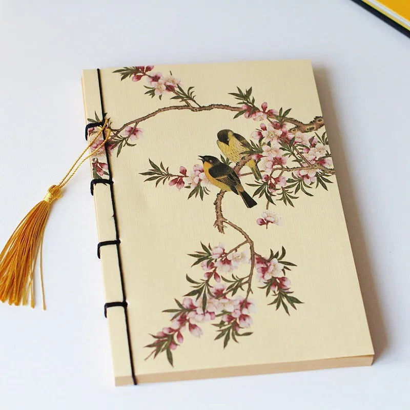 A5 antique wire-bound notebook with classical artwork cover, black oil wax rope binding, and decorative tassels