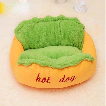 Brown sofa cushion style dog bed with removable mat, shown in a home setting.