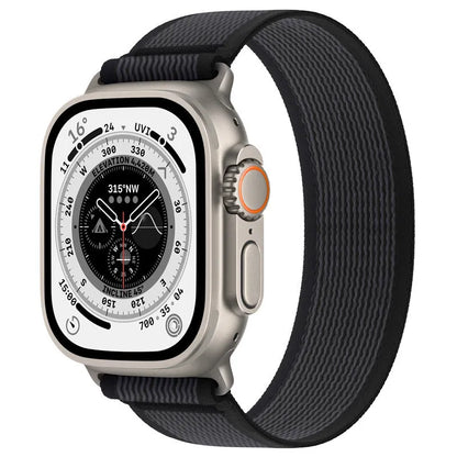 Nylon Apple Watch band with single ring strap closure in multiple colour options on a wrist