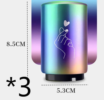 Stainless steel automatic bottle opener measuring 8.4 cm by 5.3 cm on a kitchen counter