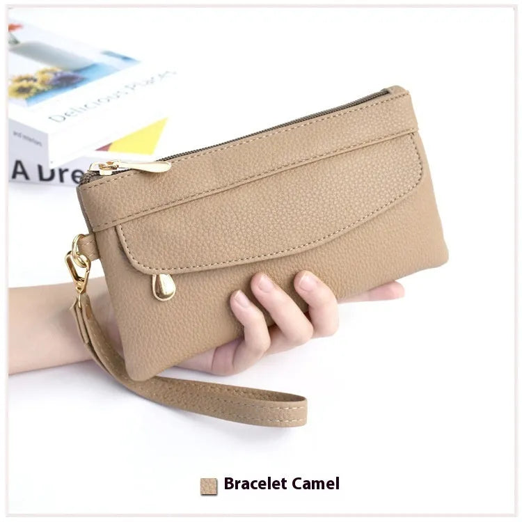Soft surface square PU crossbody bag and clutch with internal zipper pocket in various colours.