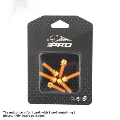 Set of six coloured stainless steel mountain bike handlebar fixing screws on a card.