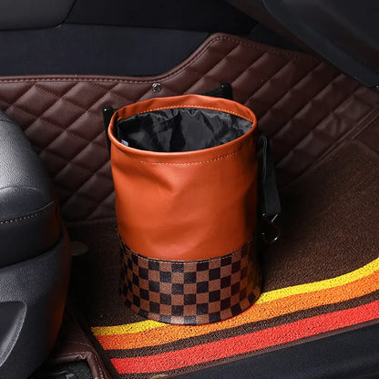 Retractable leather car trash can with handle shown in folded and expanded positions